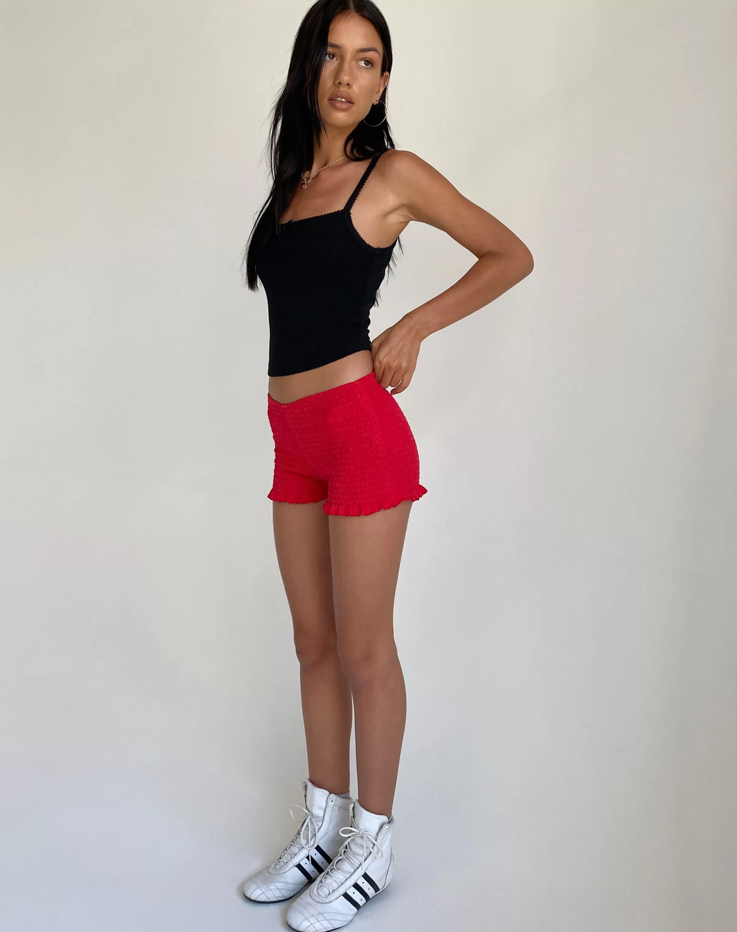 Shop Ritala Ruched Detail Frill Hem Hot Pants In SHORTS